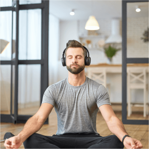 Man with headphones meditating