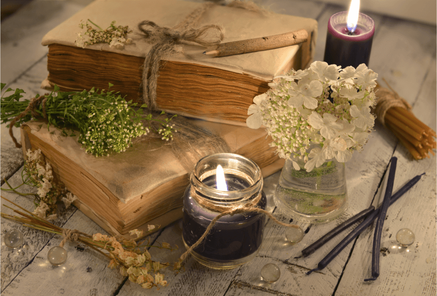 Candles, flowers and books
