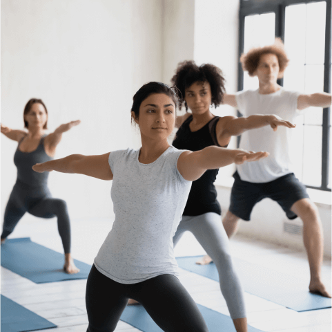 Group of people on yoga pose